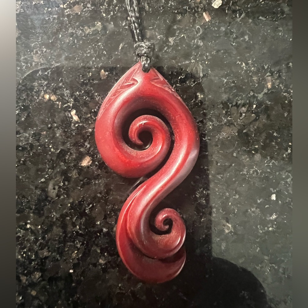 Māori-style Koru Red Swirl Pendant Necklace